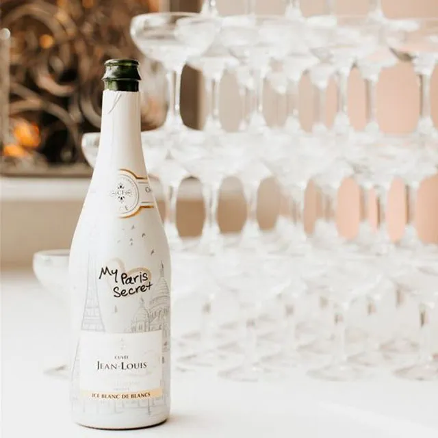 white glass champagne bottle and many champagne glass manufacturer