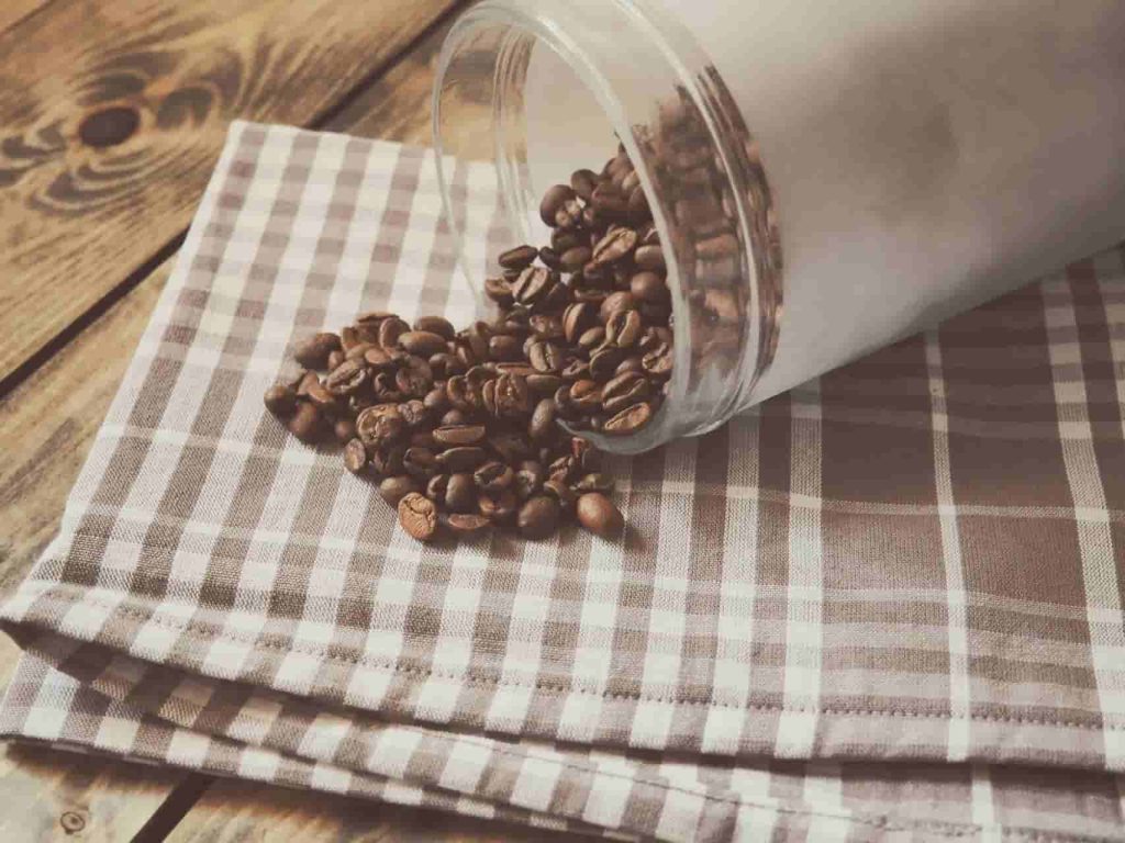 coffee bean in glass jar