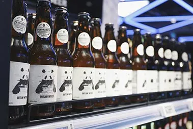 brown glass beer bottle