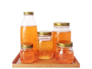 various sizes honey containers mason jars
