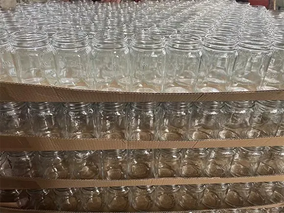 glass pickle jars well arranged in the pallet board
