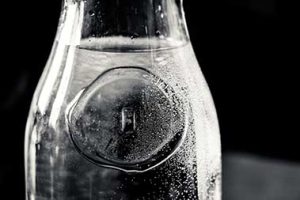 sparkling water glass bottle