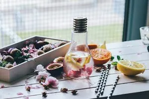 glass beverage bottles with lids