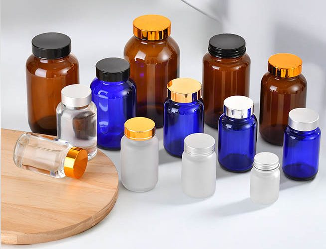 various colors of glass pill bottle